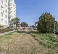 Apartment building on Štúrova Street, Malacky with surrounding greenery and parking lot.
