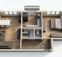 2-room apartment with wood-patterned flooring, a sofa, and a kitchen table.
