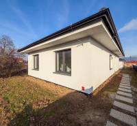 A family house on Rastislavova Street in Lužianky with a landscaped garden and walkway.
