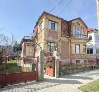 A family house on Gorkého Street in Rimavská Sobota with a front garden and an entrance gate.