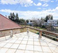 A balcony of a family house on Gorkého Street in Rimavská Sobota with a view of the surroundings.