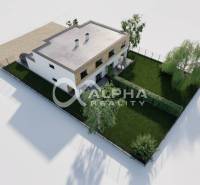 Aerial view of a family house with two chimneys and a garden in Harichovce.