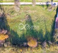 An aerial photograph of a residential plot in Spišské Podhradie with surrounding greenery.