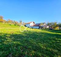 Plots - housing in Spišské Podhradie with maintained grassland and a family house.