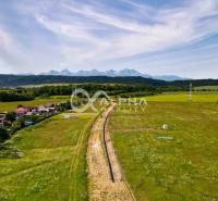 Plots - housing in Betlanovce with a view of the mountains and picturesque surrounding countryside.
