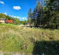 Plots - living in Spišské Vlachy with a rural atmosphere and surrounding houses in the forest.