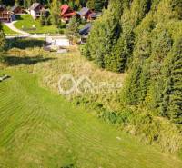 Plots - housing in Spišské Vlachy surrounded by greenery and houses, ideal for construction.