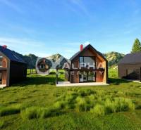 Modern wooden houses on plots in Spišské Vlachy, surrounded by mountains and nature.