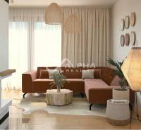 Living room with wood-patterned flooring, a sofa, and decorative lighting from the category Real Estate - Housing.