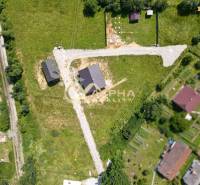 Aerial view of residential land in Markušovce with road infrastructure.