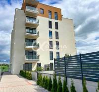 An apartment building with a modern design and balconies in Spišská Nová Ves.
