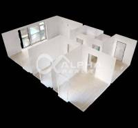 Floor plan of a 3-room apartment with wood-patterned flooring and windows.