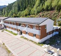A building surrounded by a forest, a 3-room apartment in Spišská Nová Ves, reinforced access road.