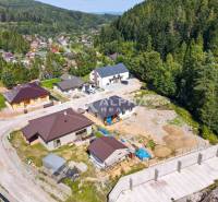 Aerial view of houses near the forest in the Spišská Nová Ves area.