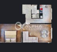 Floor plan of a 2-room apartment with a spacious living room and a wooden decor floor.