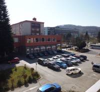 Building and parking lot on 17. novembra Street in Prešov, suitable for a 1-bedroom apartment.