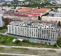 A view of residential blocks and greenery in Bratislava - Nové Mesto on Račianska Street.