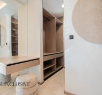 Interior of a family house with a practical wardrobe and a mirrored table.