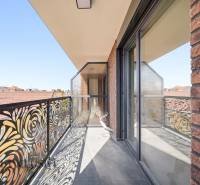 The balcony of a 2-room apartment on Bačákova Street in Dunajská Streda with decorative railing.