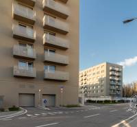 Buildings in Bratislava - Trnávka on Ivanská cesta, with garages and parking.