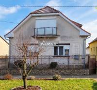 Family house in Kráľová nad Váhom, classic design, simple facade, garden with lawn.