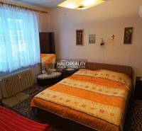 A bedroom with a large bed and decorative elements in a two-room apartment.