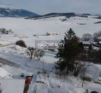A snowy landscape of Liptovské Beharovce ideal for plots - living with a view of the mountains.