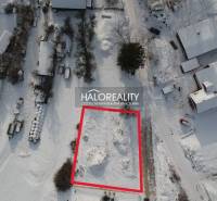 Snow-covered plot for sale in Liptovské Beharovce, suitable for living.