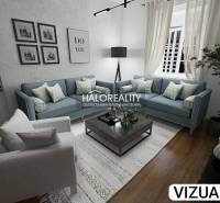 Bright living room with comfortable sofas in a 2-room apartment, floor with wooden decor.