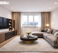 Living room in a family house with a large sofa set and a floor with a wood decor.