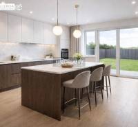 A family house kitchen with an island, a marble countertop, and a wooden-patterned floor.