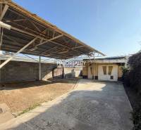 A family house in Dolné Vestenice with a covered courtyard and a carport.