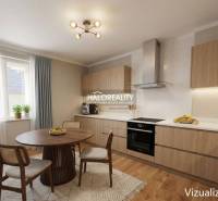 A kitchen in a family house with a wood-patterned floor and wooden furniture.