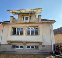 A family house in Dolné Vestenice with a terrace and a glass roof.