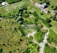An aerial view of the land in Tornala surrounded by greenery and rural houses.