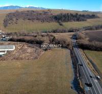 Landscape view of plots - living in Gôtovany, surrounded by road and nature.