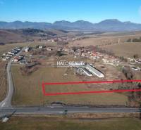 Aerial view of properties - housing in Gôtovany with a mountain panorama.
