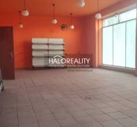 Commercial space with light orange walls, tiled floor, and six light fixtures.