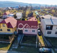 A family house in Spišské Vlachy with a spacious yard and surrounding garden.