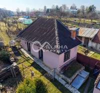 A family house in Spišské Vlachy with a courtyard, garden, and shelter in a quiet environment.