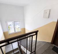 The staircase in the entrance of the apartment building, view of Dolné Suroviny street, Senica.