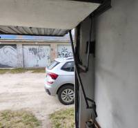 View from the garage on Kozmonautov Street in Martin, car parked in front of the garage.