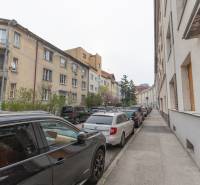 Šoltésová Street in Bratislava - Staré Mesto with a row of cars and residential buildings.