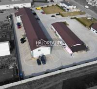 Industrial facilities, large commercial spaces, parking spaces, enclosed area, business use.