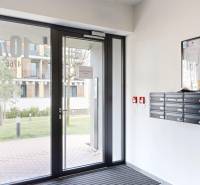 Entrance hall with mailboxes on Hany Ponická Street in Bratislava - Lamač, near a 4-room apartment.