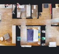 Floor plan of a 4-room apartment with furnishings and flooring with a wooden decor.