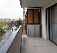 A balcony with tiles in a 2-room apartment, view of Trnavská cesta in Bratislava - Ružinov.
