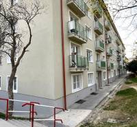 Apartment building on Šuňavcova Street in Bratislava - Nové Mesto, with landscaped grounds.