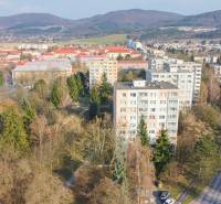 A view from above of the housing estate and surrounding nature on Trenčianska Street in Nová Dubnica.