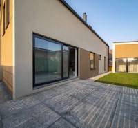 A family house in Poprad with a spacious terrace and glass doors.
